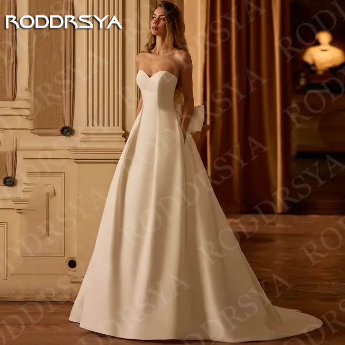 Robe de mariée RODDRSYA en satin sans bretelles pour femme, silhouette en une ligne, décolleté Mon Amour, fermeture éclair invisible, soutien-gorge intégré, pour occasions spéciales