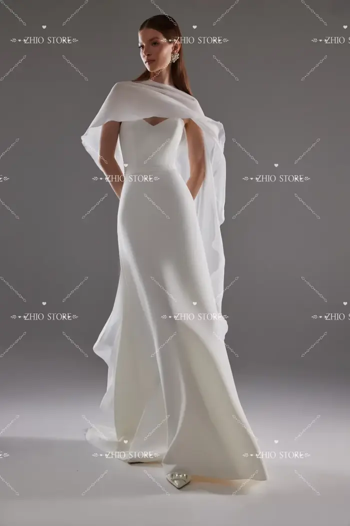 Robe de mariée sirène fluide ZHIO en satin mat et mousseline pour mariée élégante avec dos à lacets et décolleté Mon Amour
