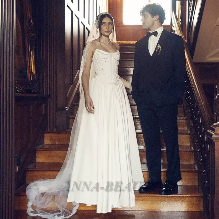 Robe de mariée Anna en polyester, style bustier, ornée de fleurs et perles, traîne balayante, personnalisable pour cérémonie de mariage ou anniversaire de mariage