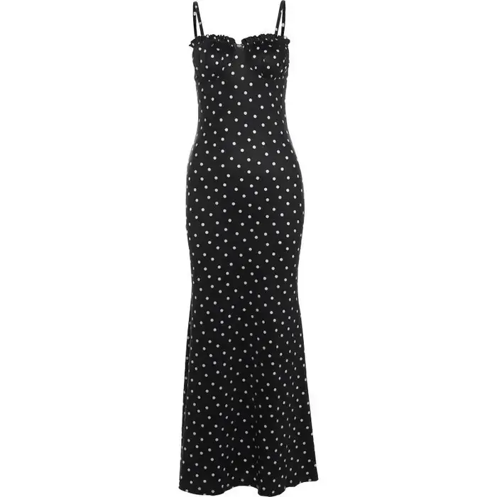 Robe noire à pois, figurine féminine serrée