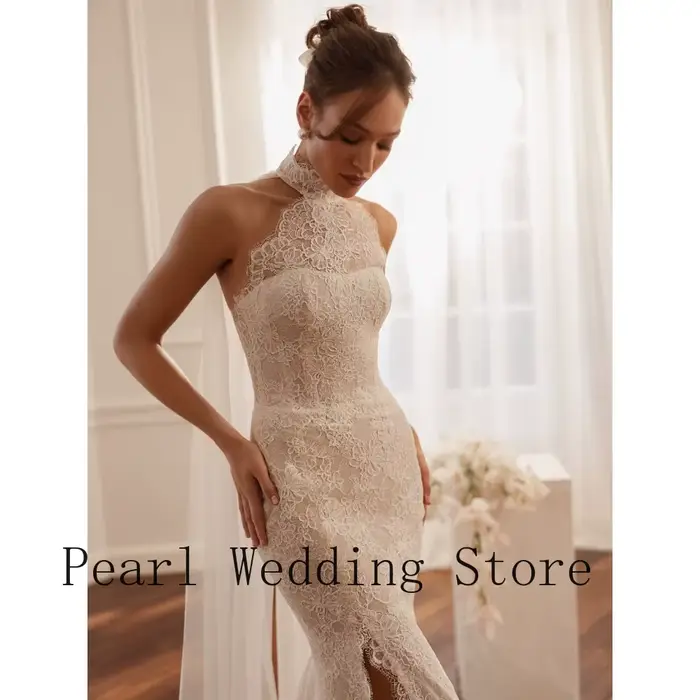 Robe de mariée sirène à col halter en dentelle