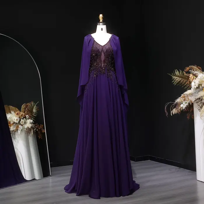 Robe de soirée Sharon Said bleu marine perlée à col en V avec cape en mousseline de soie coupe trapèze شارون سعيد