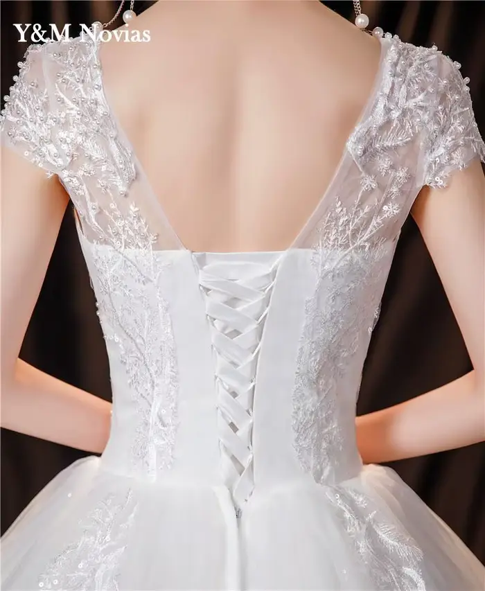 Robe de mariée en Tulle ivoire blanc cassé