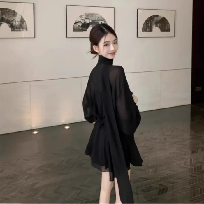Robe élégante noire de style français à manches longues avec ceinture