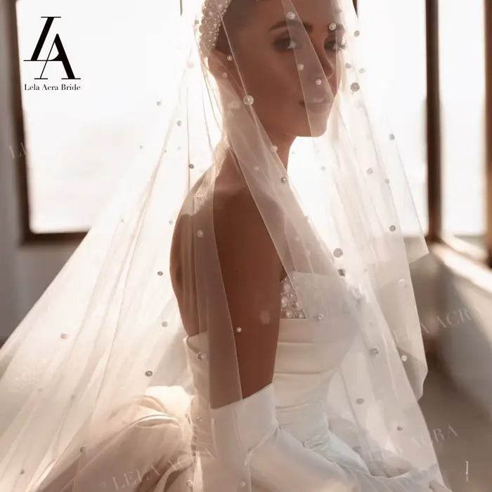 Magnifique robe de mariée en perles 2026 Satin sans manches