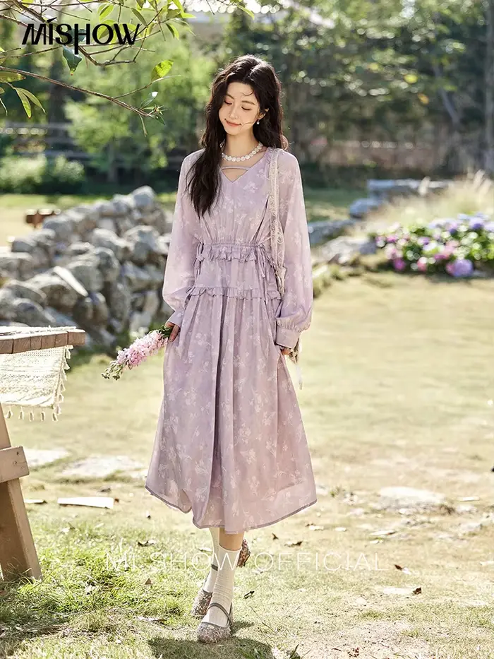 Robe noire élégante à manches longues pour femme