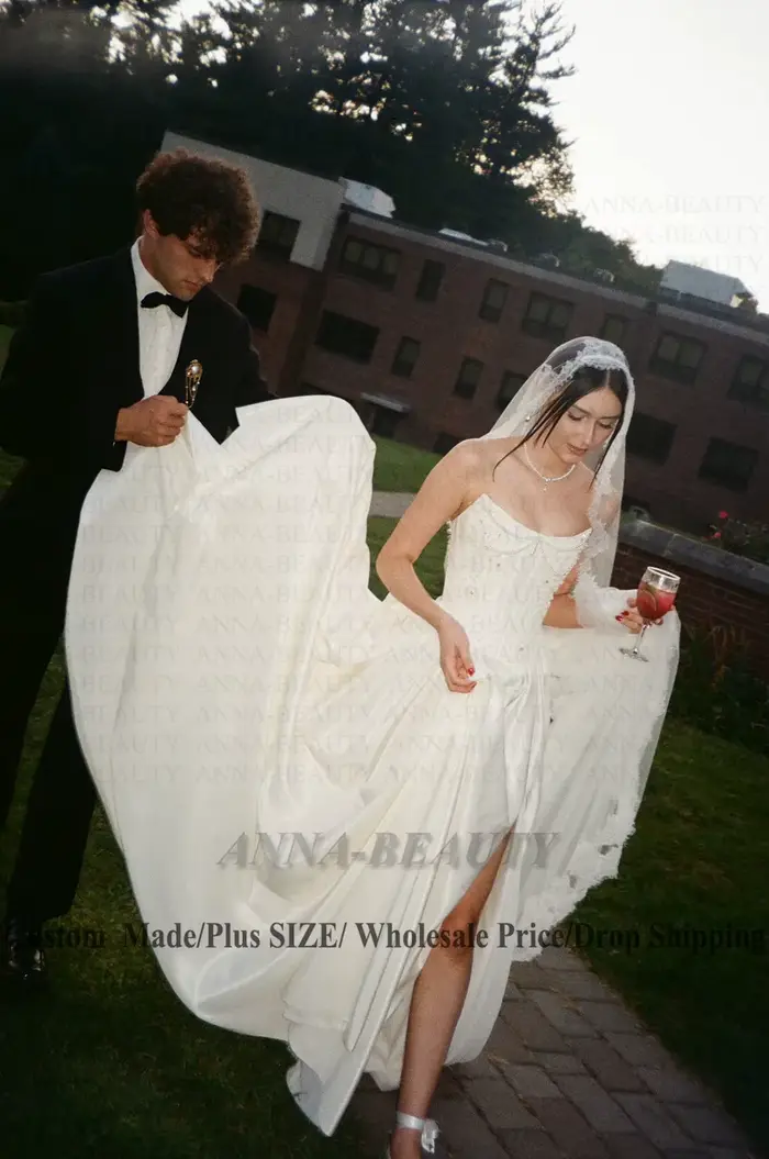 Robe de mariée Anna en polyester, style bustier, ornée de fleurs et perles, traîne balayante, personnalisable pour cérémonie de mariage ou anniversaire de mariage