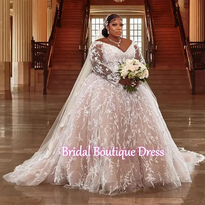 Robes de mariée grande taille à manches longues