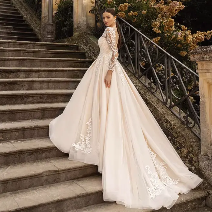 Robes de mariée ivoire à manches longues