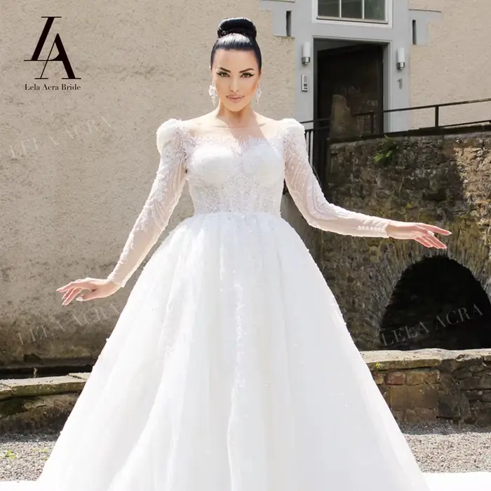 Robe de mariée trapèze à manches longues