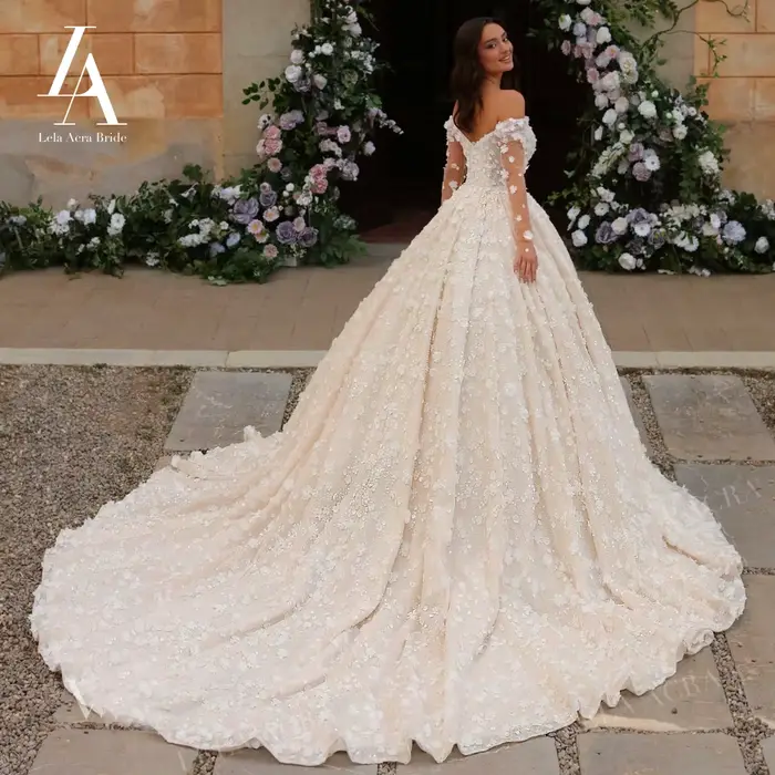 Robe de mariée à manches longues 2026 romantique perlée 3D fleurs