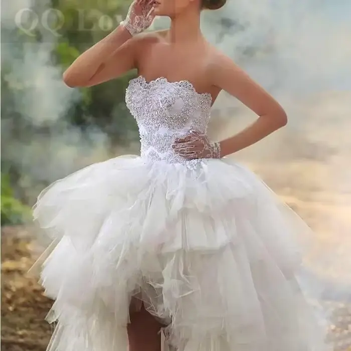 Robe de mariée en dentelle avec perles