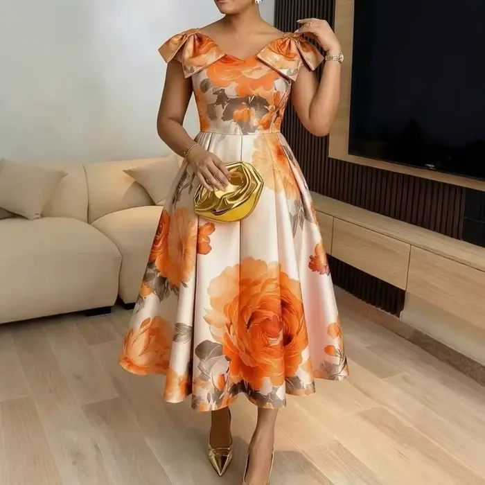 Robe élégante à imprimé floral orange à la française avec col à volants