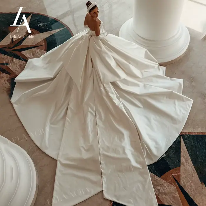 Magnifique robe de mariée en perles 2026 Satin sans manches