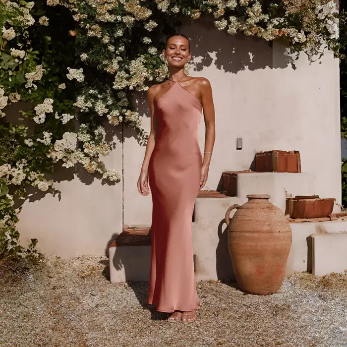 Robes de soirée pour femmes printemps été nouveau Sexy solide mince sans manches dos nu tempérament Maxi