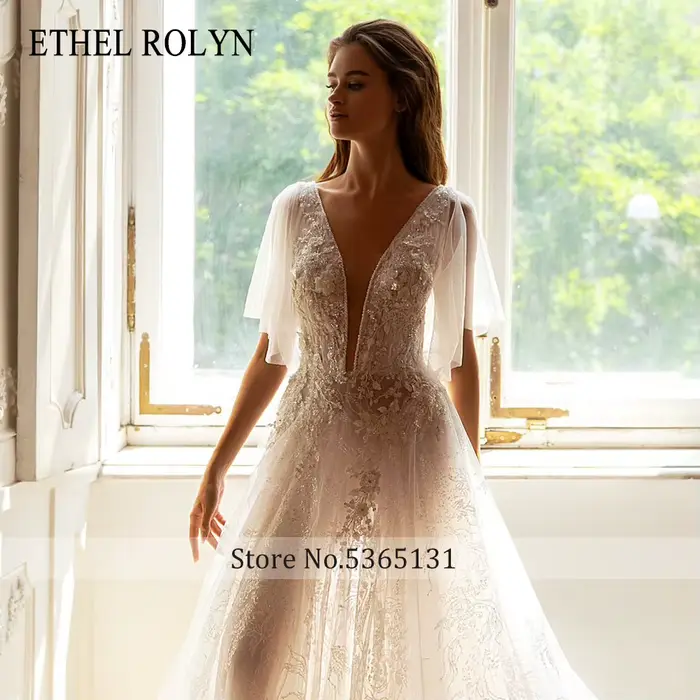 ETHEL ROLYN robe de mariée trapèze perles délicates fleurs col en v