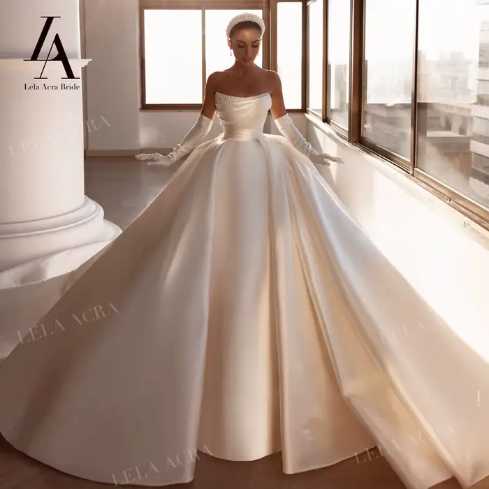 LelaAcra magnifique robe de mariée en perles 2026 Satin sans manches robe de bal Court Train princes