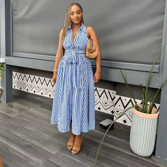 Robe longue femme coupe trapèze Y2K streetwear sans manches col rabattu élégante pour soirées et travail polyester composition fibre synthétique多种语言的代码,指示创建一个HTML页面来描述一件女士长裙的产品信息,并且要求使用中文撰写。请将回应转换为中文,并确保HTML结构符合要求。