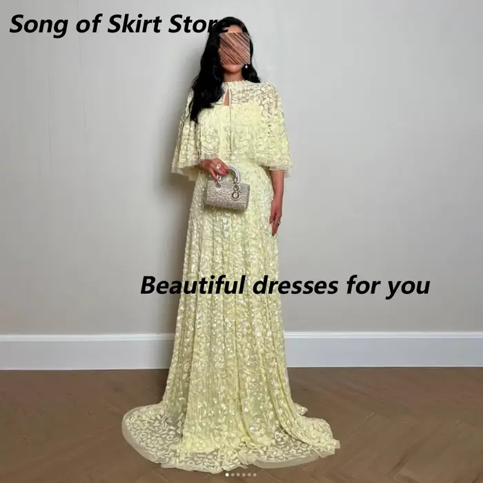 Robe de soirée de luxe jaune avec appliques en dentelle