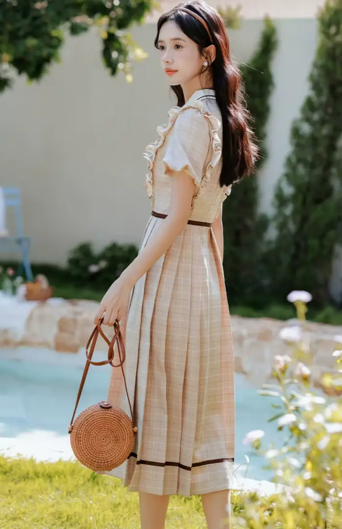 Robe à carreaux style préppy anglaise élégante avec nœud doux pour femmes occasions spéciales soirée fête vacances