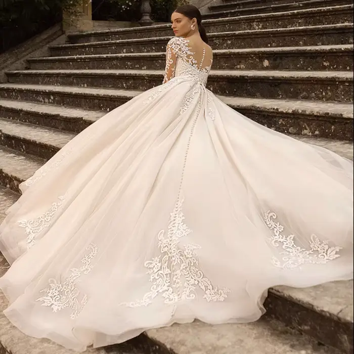 Robes de mariée ivoire à manches longues