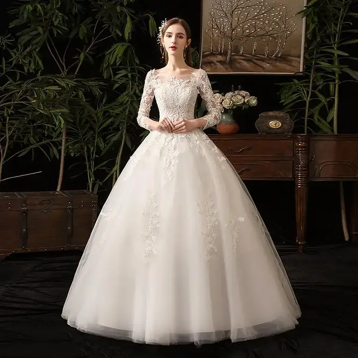 Robes de mariée en dentelle à manches longues