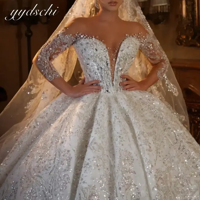 Robes de mariée de luxe personnalisées de Dubaï, col en V profond, ornées de cristaux brillants, nou