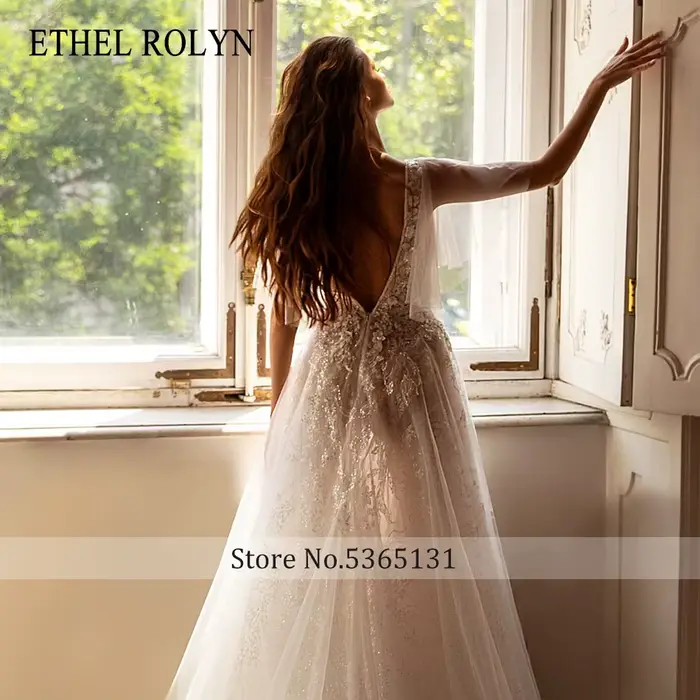 ETHEL ROLYN robe de mariée trapèze perles délicates fleurs col en v