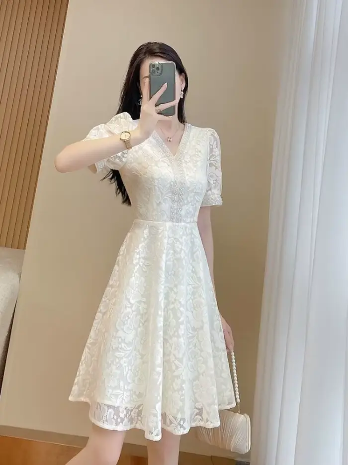 Robe mi-longue blanche pour femme