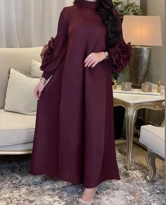 Femmes élégantes robes de soirée 2025 été nouvelle couleur unie classique à manches longues plaque fleur conception