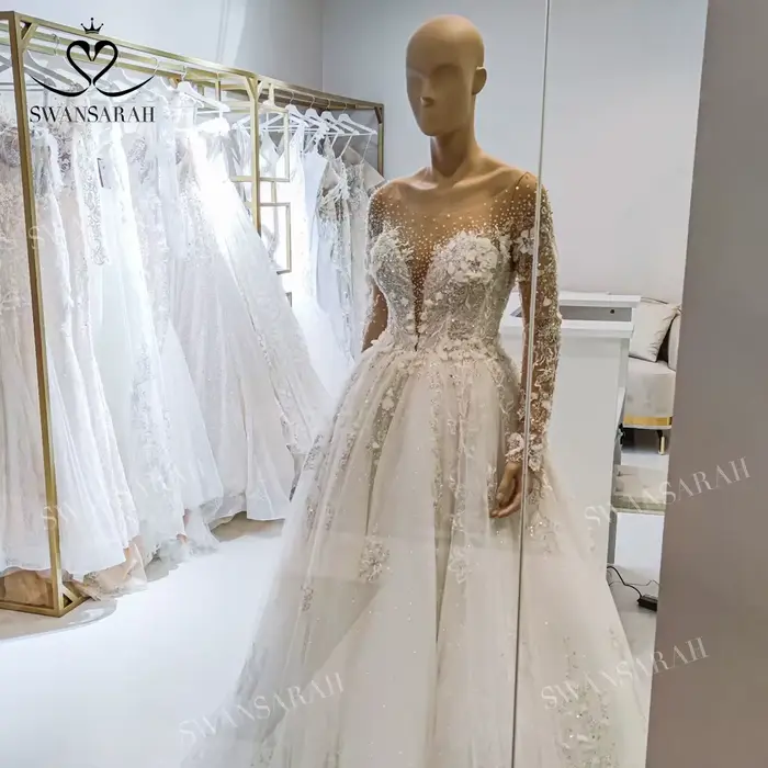Robe de mariée de luxe perlée 2026 à manches longues avec appliques en dentelle