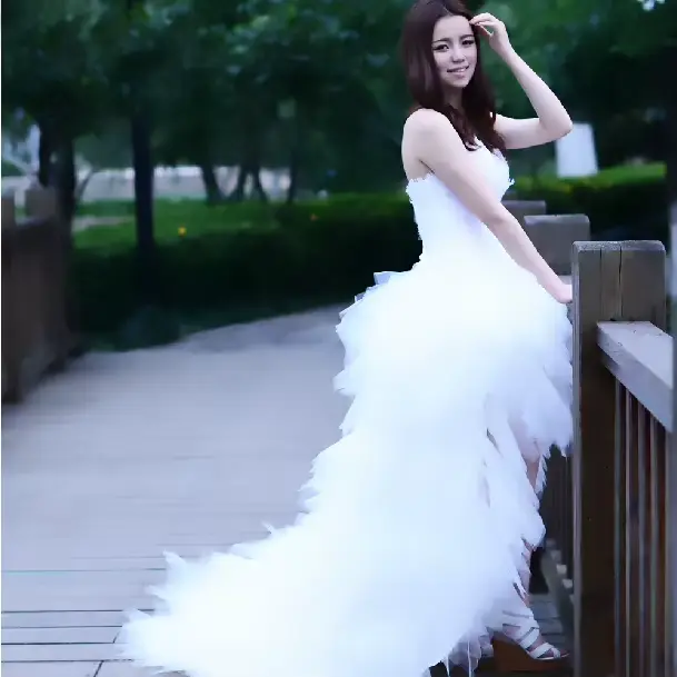 Robe de mariée Eleant plume bretelles à lacets princesse luxe avant court dos longues robes