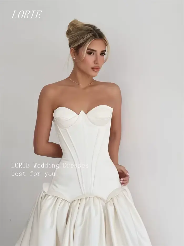Robe de mariée LORIE coupe trapèze style minimaliste décolleté cœur élégante sans manches personnalisable pour cérémonies civiles luxe occassions spéciales