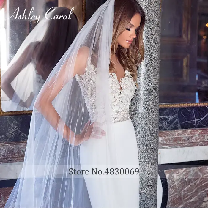 Ashley Carol dentelle sirène robes De mariée Sexy col en v cristal