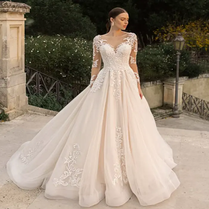 Robes de mariée ivoire à manches longues