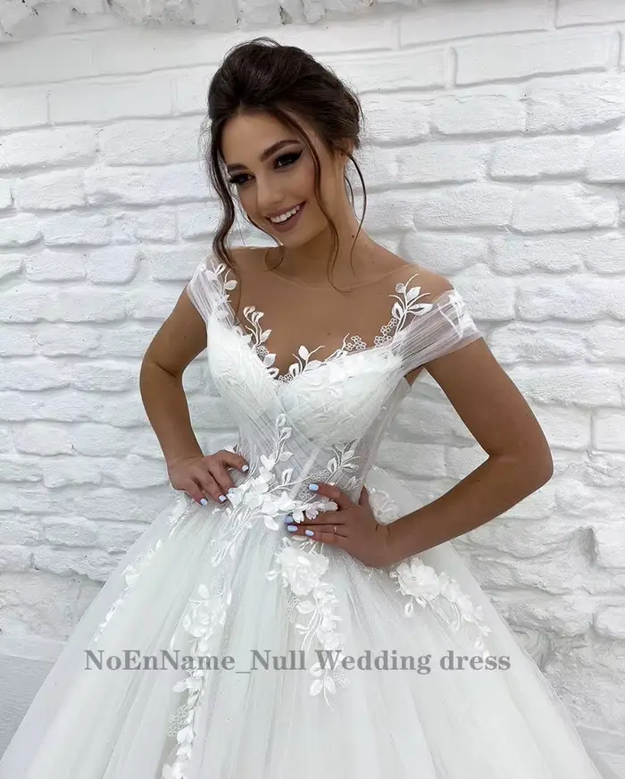 Robe de mariée princesse décolleté en V sans manches ornée de dentelle 3D et appliques pour femmes occasions spéciales soirée gala mariage