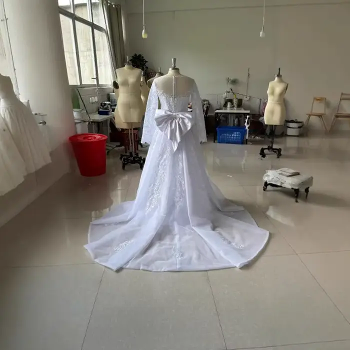 Robe de mariée sirène en dentelle à manches longues