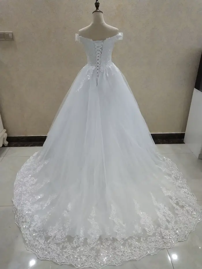 Robe de mariée princesse personnalisée en dentelle