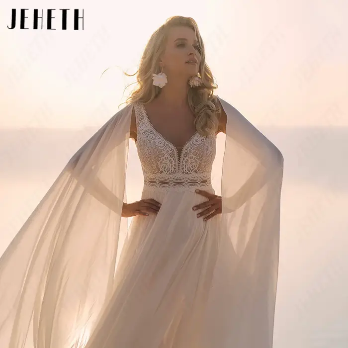 JEHETH Robe de Mariée Bohème Sans Manches Mousseline Coupe A Sur Mesure Col V Profond Dos Nu Appliques Dentelle Taille Découpée Jupe Longue Flottante Mariage Plage Shooting Coucher de Soleil Bord de M