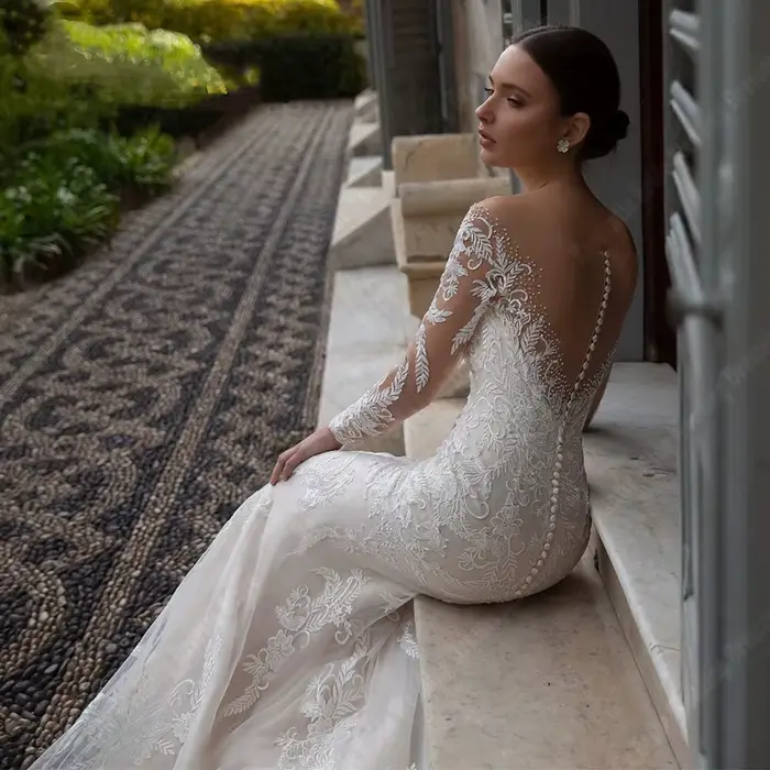 Robes de mariée sirène en dentelle à manches longues pour femmes