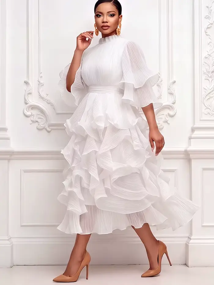Robe midi plissée en mousseline à volants