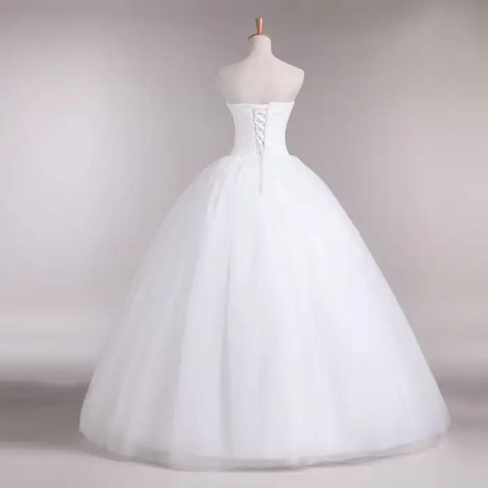 Robe de mariée ivoire sans bretelles à lacets