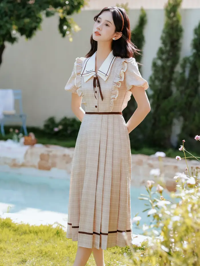 Robe à carreaux style préppy anglaise élégante avec nœud doux pour femmes occasions spéciales soirée fête vacances
