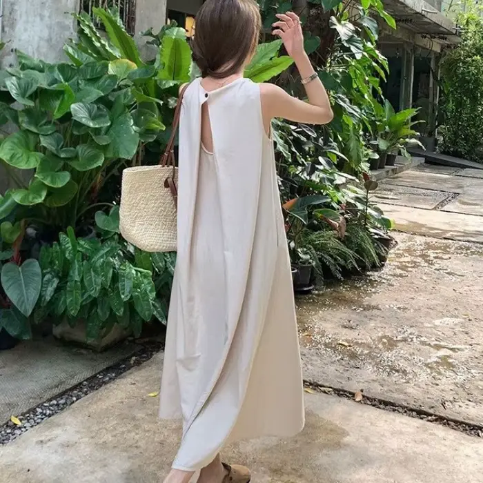 Robe longue de plage sans manches et dos nu pour femme, coupe ample, blanche, en fibre de polyester, col rond, jupe trapèze pour les vacances d'été occasions spéciales