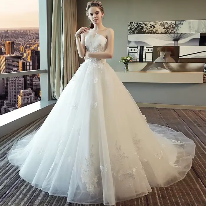 Robe de mariée traînante 2026