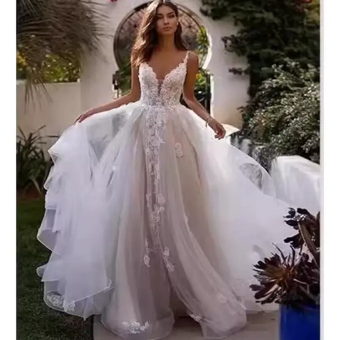 Robe de mariée blanche à bretelles