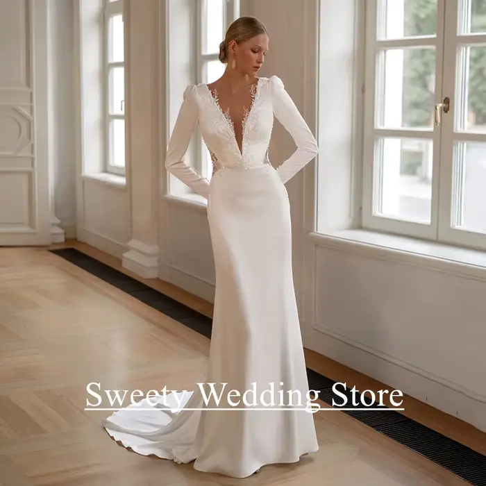 Robe de mariée sirène sexy personnalisée avec col en V profond, manches longues, appliques de perles et train de balayage pour cérémonie de mariage et occasions spéciales