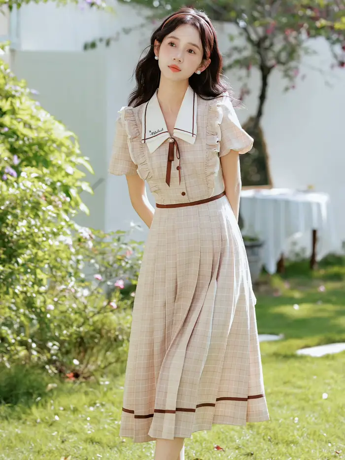 Robe à carreaux style préppy anglaise élégante avec nœud doux pour femmes occasions spéciales soirée fête vacances