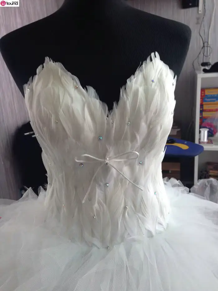 Robe de mariée Eleant plume bretelles à lacets princesse luxe avant court dos longues robes