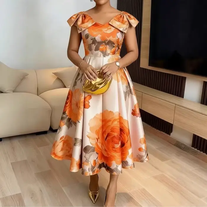 Robe élégante à imprimé floral orange à la française avec col à volants